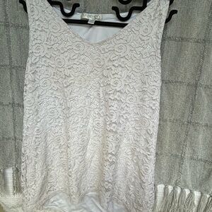 Lace camisole or Tamk can be worn either way.